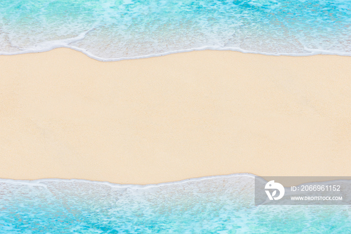 Soft wave of Blue ocean on sandy Beach. Abstract natural Background.