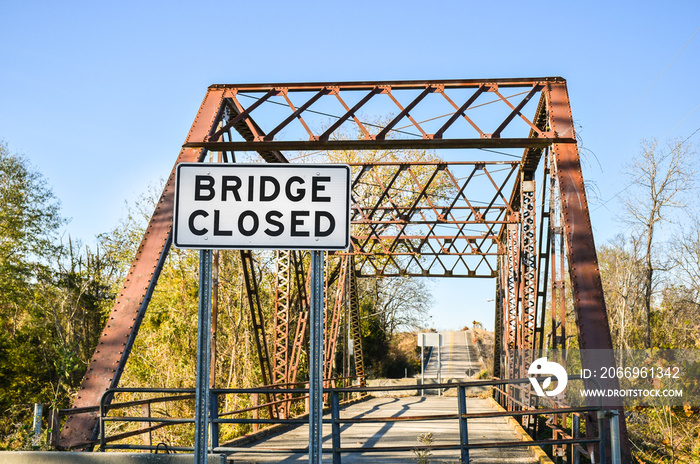 Bridge closed sign on an old bridge