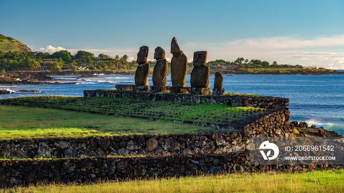 Ahu Tahai against ocean and Hanga Roa in Rapa Nui