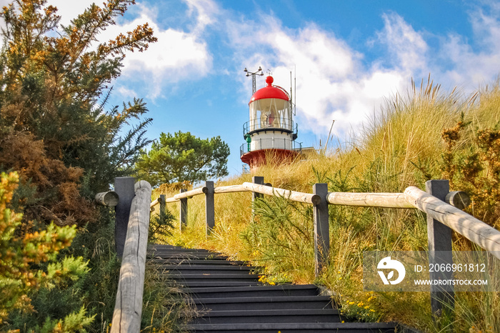 Stairs towards the lighthouse of the Frisian Island of Vlieland. The Frisian Islands, also known as the Wadden Islands or Wadden Sea Islands, form an archipelago at the eastern edge of the North Sea