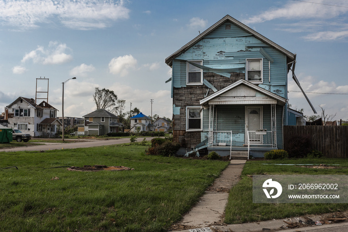 Neighborhood shredded by tornado starting to recover with green lawn