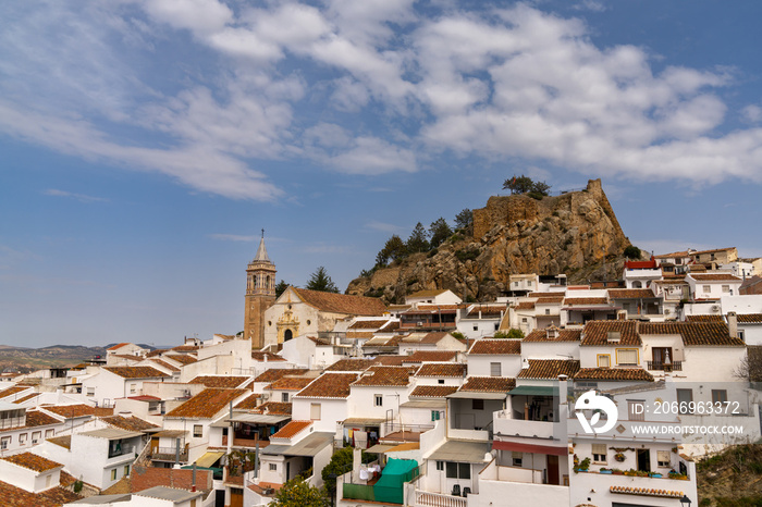 the historic whitewashed Andalusian village of Ardales with its church and Moorish castle ruins