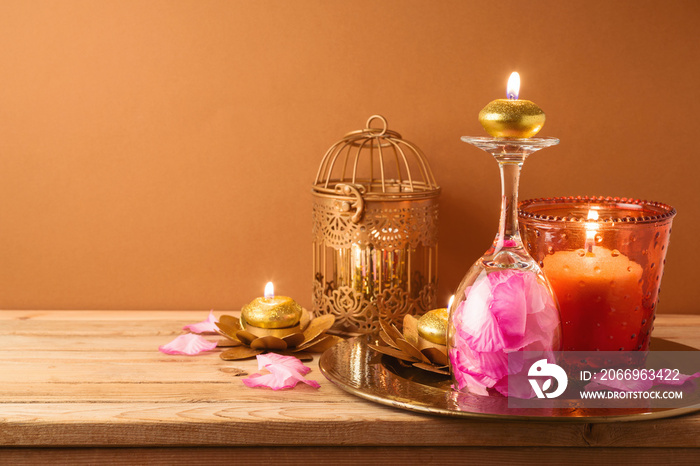 Diwali holiday home decorations on wooden table.