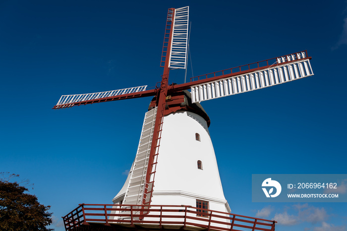 old windmill on background of blue sky