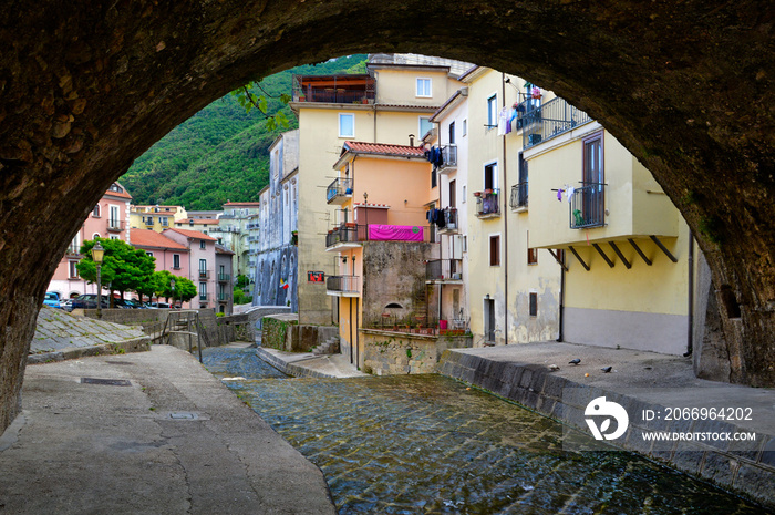 A river between the old houses of the town of Campagna in the province of Salerno, Italy.