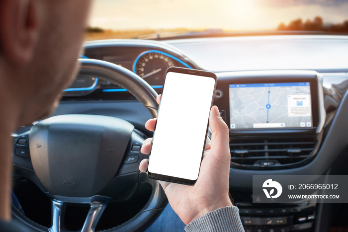 The driver uses the phone while driving. Modern smart phone with round edges. Isolated screen for mockup. Car navigation display in background.