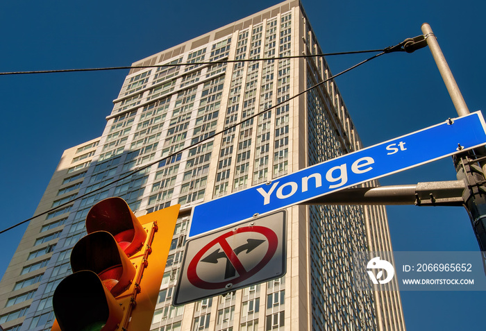 Yonge Street sign with buildings in background