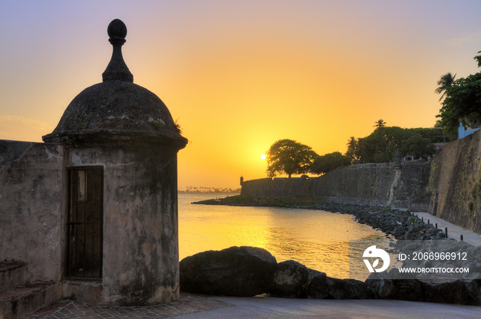 Beautiful summer sunset at the outer wall with sentry box of fort San Felipe del Morro in old San Juan in Puerto Rico