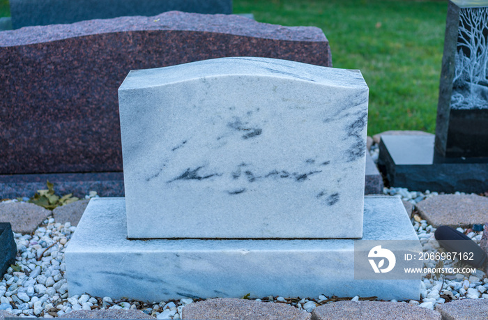 Brand new clean memorial gravestone, marble and granite, grave yard