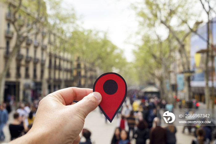 man with a red marker in Las Ramblas, Barcelona.