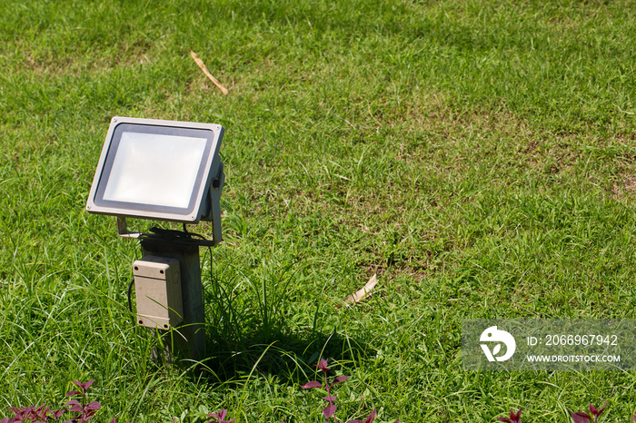 Close up outdoor LED lamp on the yard. Electrical light in the night. image for background, wallpaper and objects.