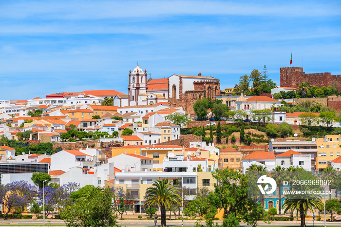 View of Silves town buildings with famous castle and cathedral, Algarve region, Portugal