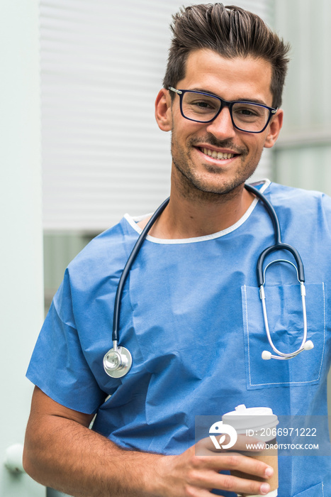 Doctor with glasses smiling posing