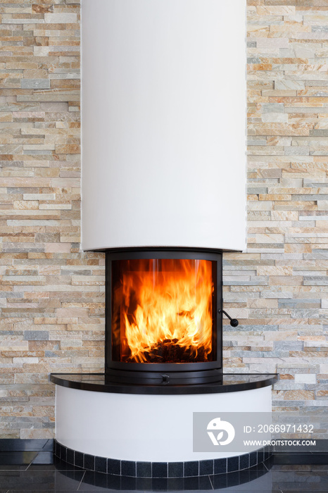 An interior shot of a modern marble fireplace