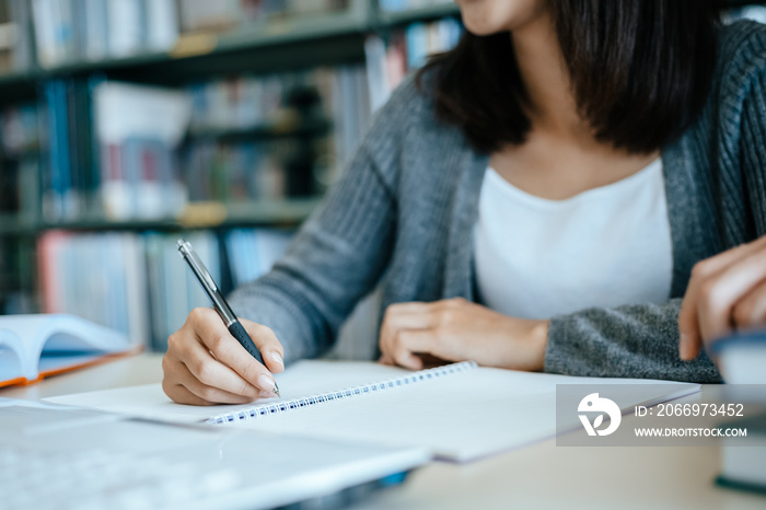 Hand high school or college students hold pen and learning tutoring on desk and reading, doing homework, lesson practice preparing exam. Education concept.