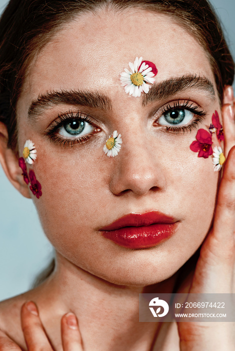 Beautiful fashion model portrait, spring make up style with flowers, soft aesthetic look