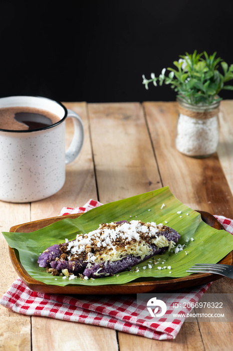 Puto bumbóng is a Filipino purple rice cake steamed in bamboo tubes. It is traditionally sold during the Christmas season.