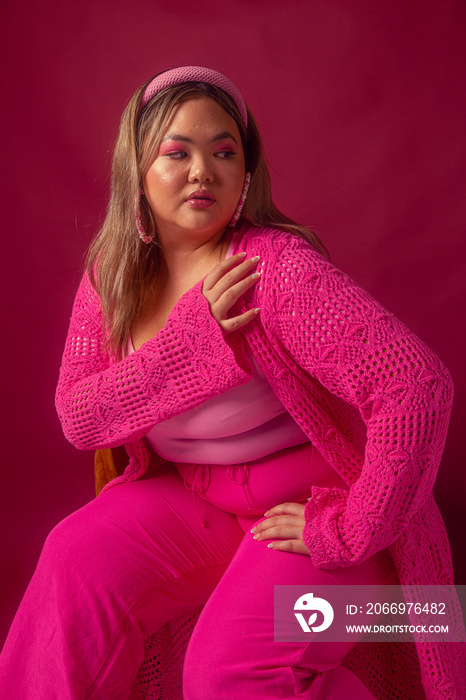 Asian individual fashion colour-blocked studio portrait