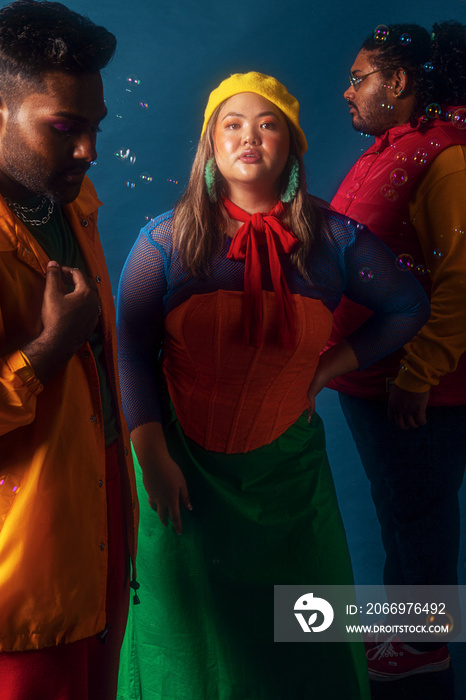 Asian trio colour blocked studio portrait