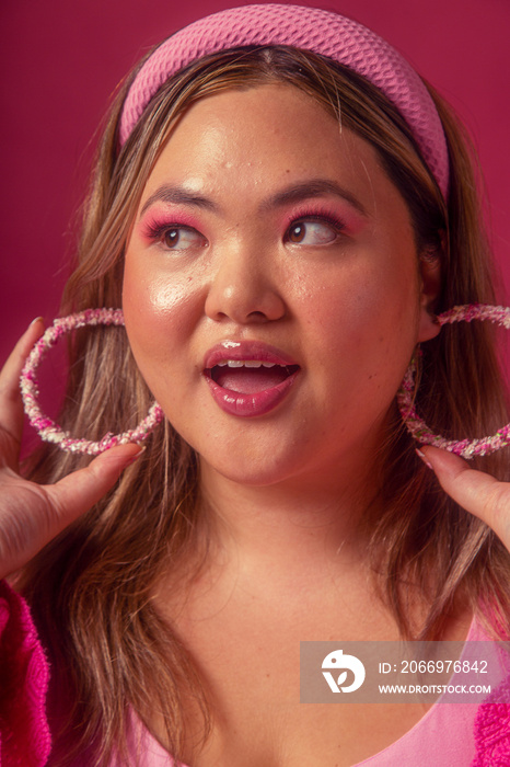 Asian individual fashion colour-blocked studio portrait