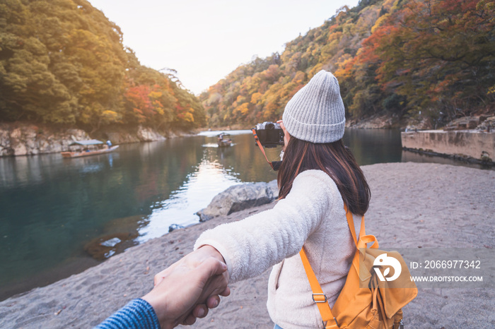 Young couple traveler looking beautiful landscape at arashiyama Japan, Travel lifestyle concept