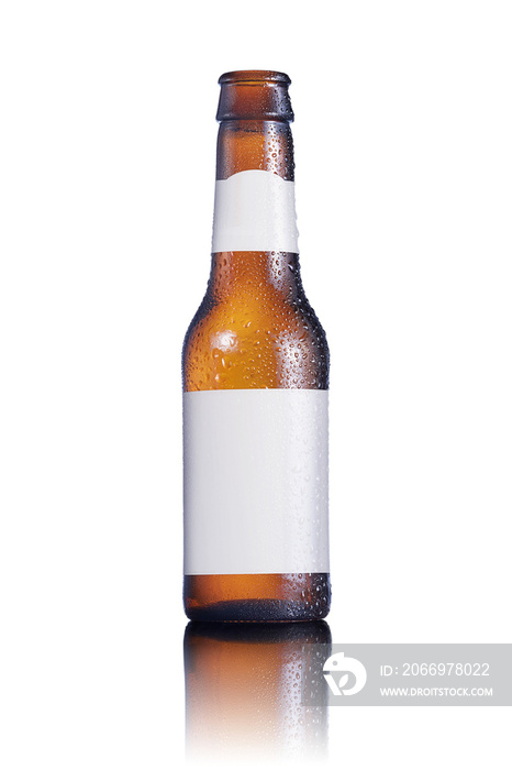 Cold Beer bottle with condensation drops and white labels and a semitransparent reflection