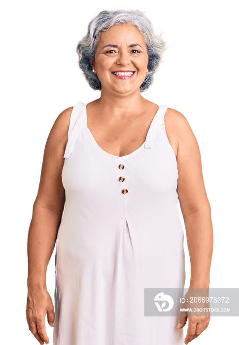 Senior woman with gray hair wearing casual clothes with a happy and cool smile on face. lucky person.