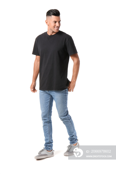 Handsome young man in stylish t-shirt isolated on white