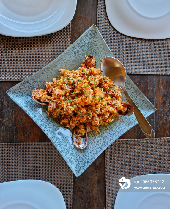 Plate of food, with seafood and rice