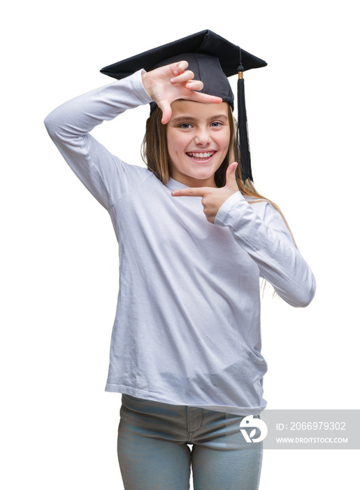 Young beautiful girl wearing graduate cap over isolated background smiling making frame with hands and fingers with happy face. Creativity and photography concept.