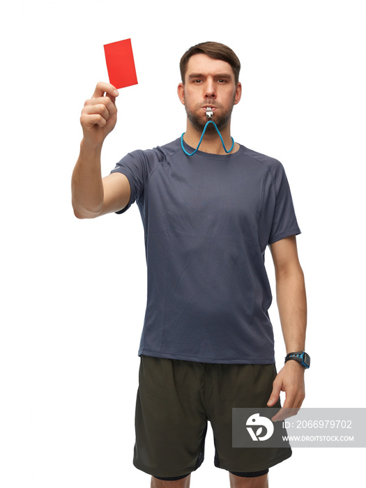 sport, refereeing and people concept - male referee whistling whistle and showing red penalty card