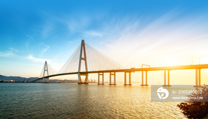 Landscape of the bridge over the sea at dusk