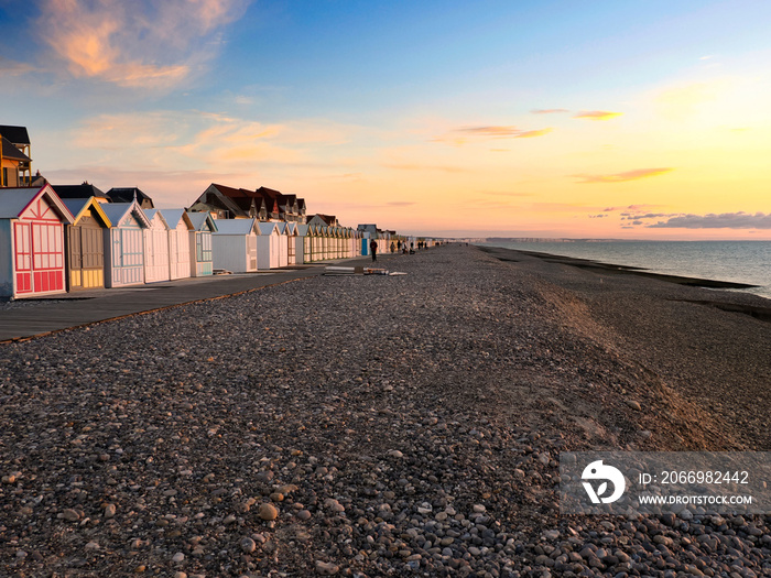 Sunset on the sea with gulls at Cayeux sur Mer, a resort town in the Somme department in Hauts-de-France in northern France. The town is part of the Baie de Somme