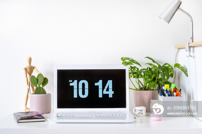 Girly home office / student room desk setup with white laptop and plants, mockup, quarantine