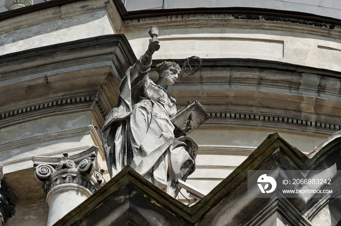 The one of the sculptures on the facade of St. Eucharist Church, the former Dominican Church in Lviv, Ukraine