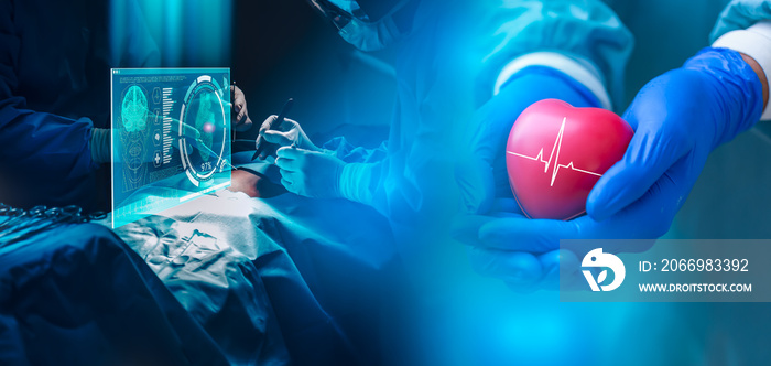 Doctor performed the surgery to change the patient’s heart with VR technology or hologram monitor.Doctor hands holding red heart, health care,insurance and life insurance,technology concept.