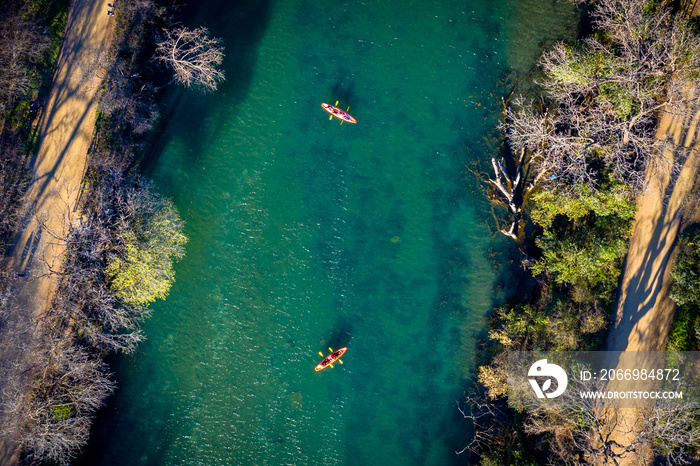 Kayaks on a Stream