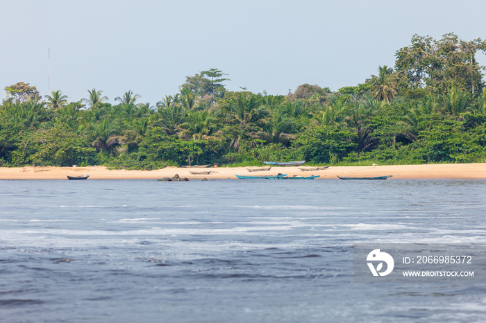 Cameroon, South Region, Ocean Department, Kribi, sandy beach and palm trees by the sea