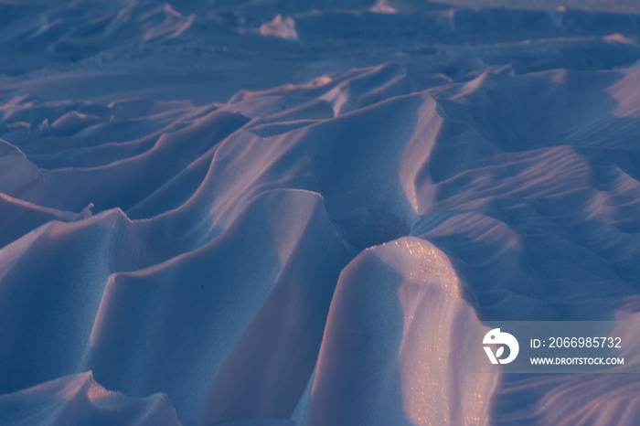 wind blown icy snow drifts in churchill manitoba