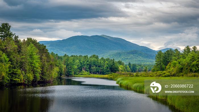 Looking south over the Ausable River on a cloudy day towards the Sentinel Mountain Range in Wilmington, the Adirondacks, New York