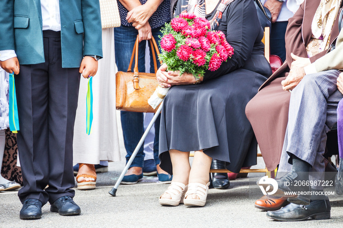 Woman veteran with bouquet of flowers