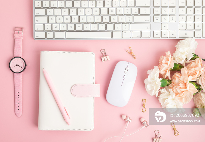 Home office desktop and flowers. Modern workspace with notebook, office stationary. Freelance business, organization, wedding planning flat lay