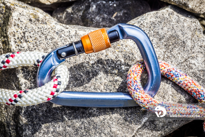 Two climbing ropes connected with carabiner