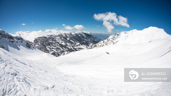 Risoul resort, French alps in winter, snowy mountains in France