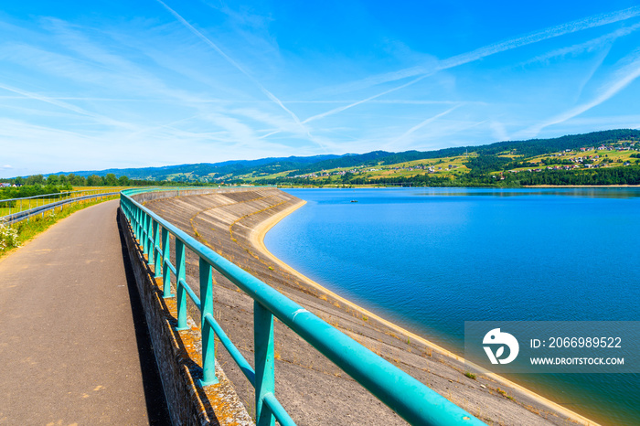 Cycling way along Czorsztynskie lake in Frydman village, Pieniny Mountains, Poland