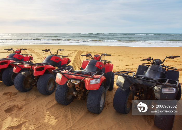 Several ATVs on the beach