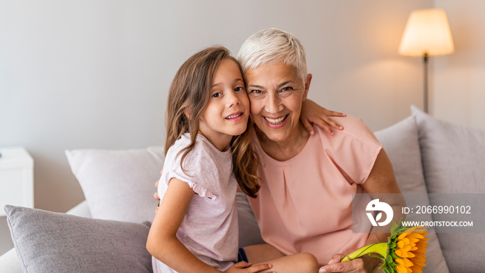 Closeup summer portrait of happy grandmother with granddaughter indoors. Grandmother and granddaughter. Happy family. She taught me the value of love. My gran means the world to me