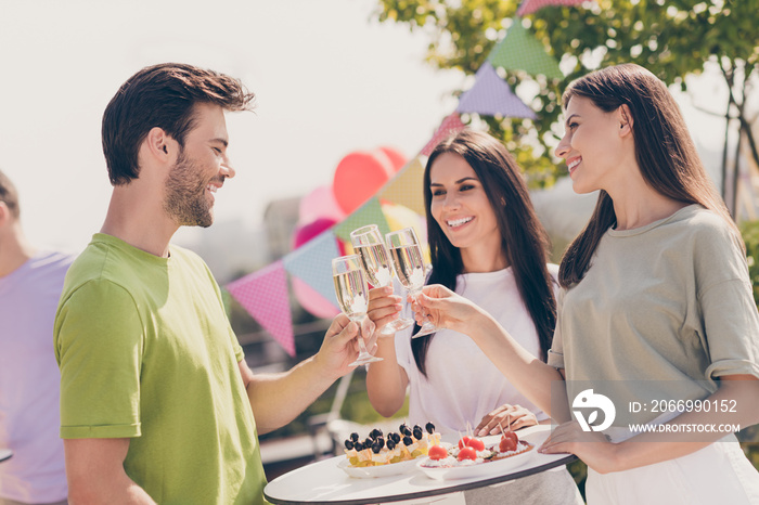 Photo of three friends drink champagne happy positive smile chat talk have fun celebrate enjoy summer party