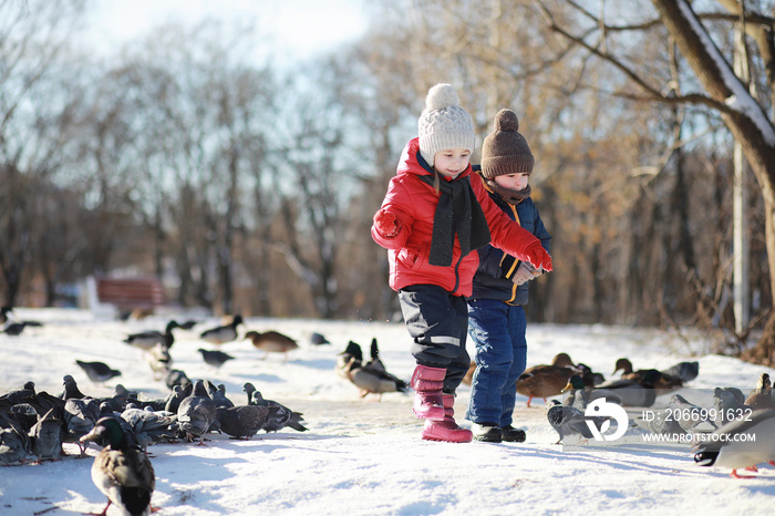 Children in winter park play