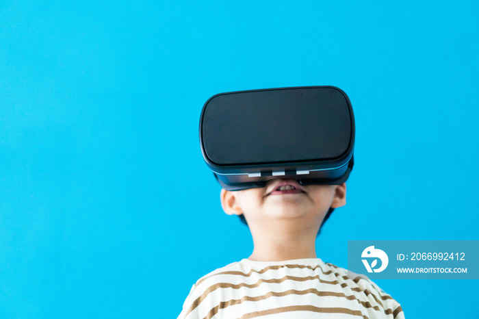 kid child toddler boy playing game on virtual reality vr glasses.future digital technology. kid toddler boy play VR virtual.future technology.Online learning education student with innovation tech.